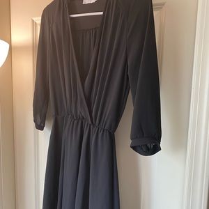 Long sleeve black dress.